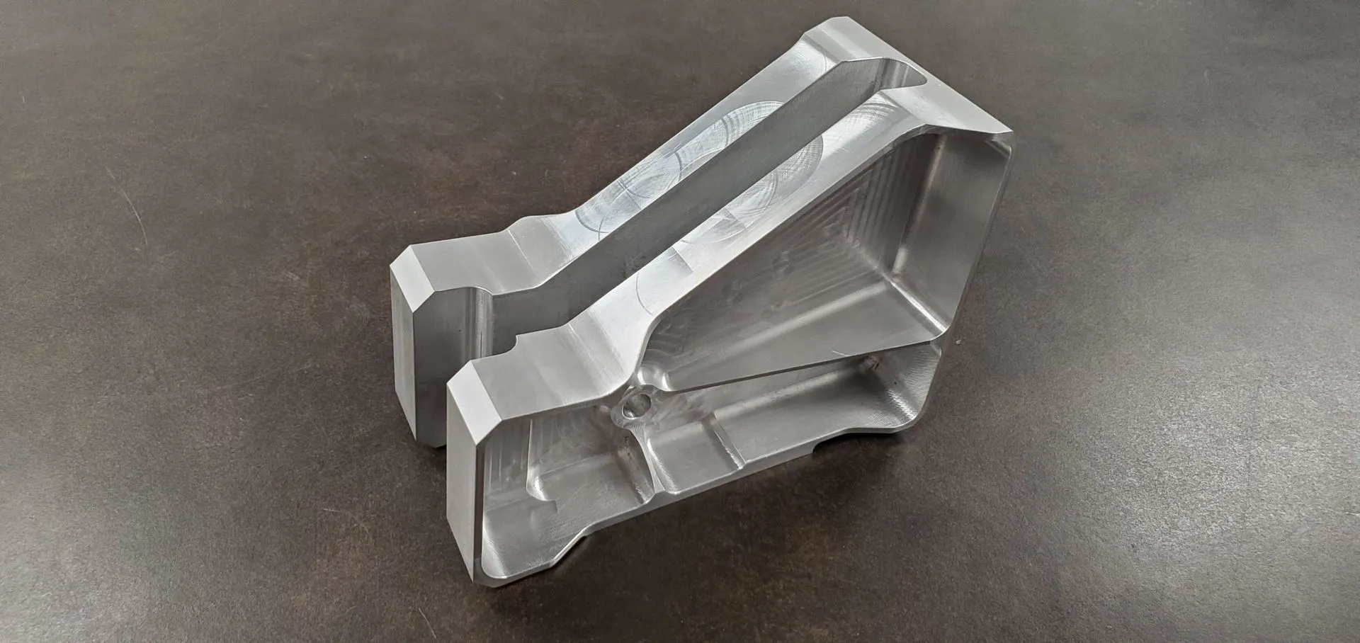 Precision tooling plate with machined pockets and accurately located features.