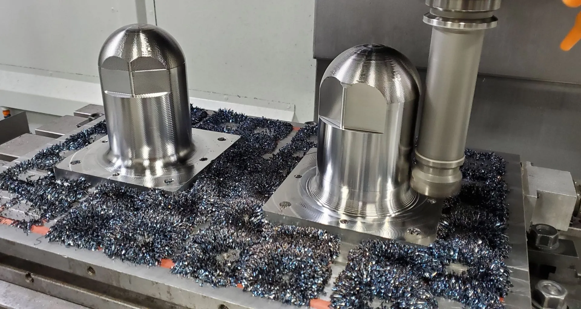 Machined components staged for finishing and secondary processing.