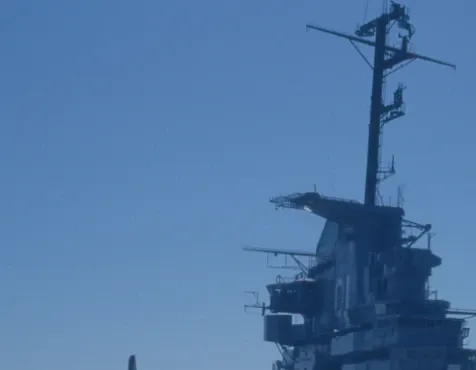 Naval vessel representing defence sector component machining.